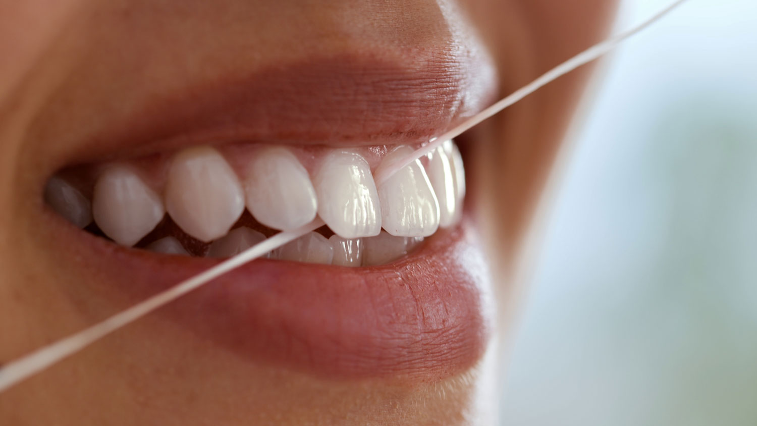 Flossing with the Proper Technique Matters